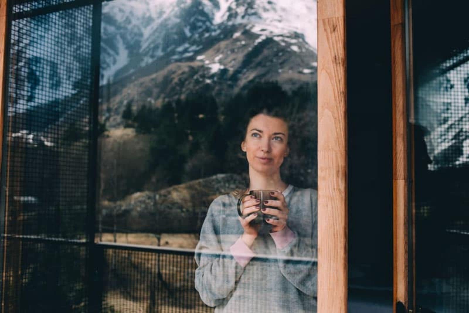 portrait of woman looking outside