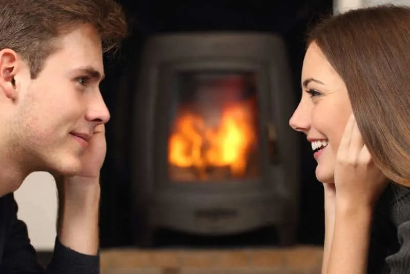 side view of couple looking each other