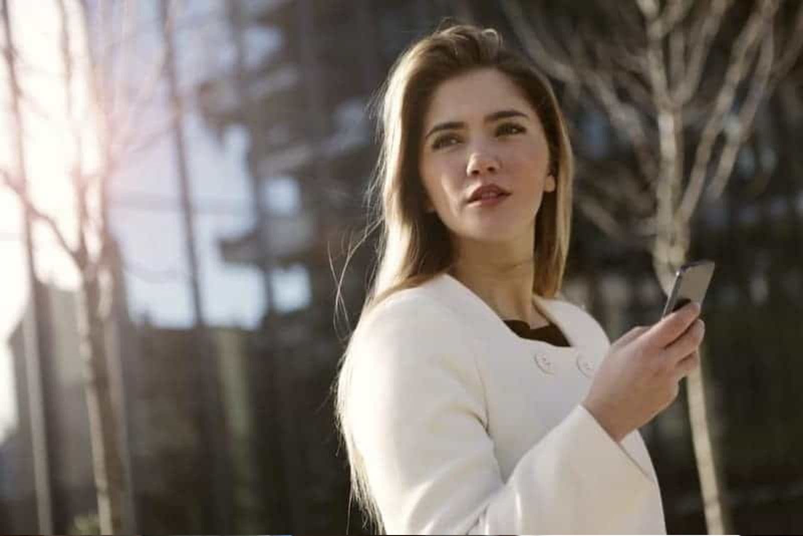 woman in a white long sleeve