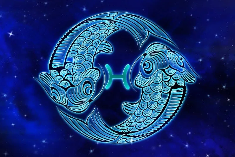 pisces horoscope sign on blue background