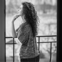 woman standing on a terrace