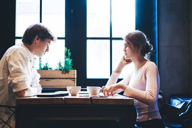 bored couple having a coffee