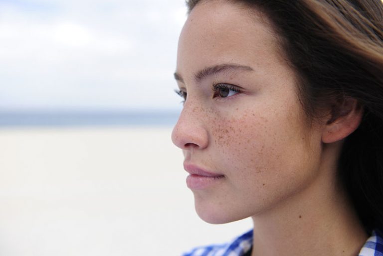 beautiful serious woman looking away