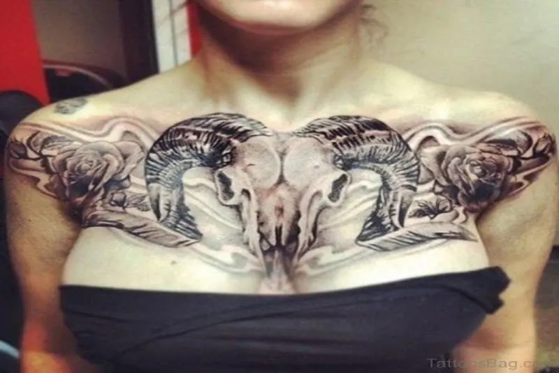 Gray ink Aries ram skull tattoo on chest