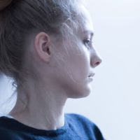 woman with mental problems looking away
