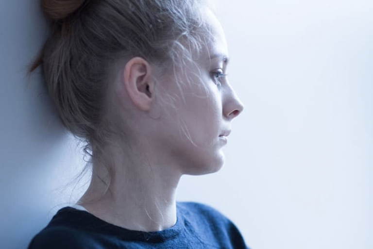 woman with mental problems looking away