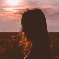 woman's silhouette during sunset