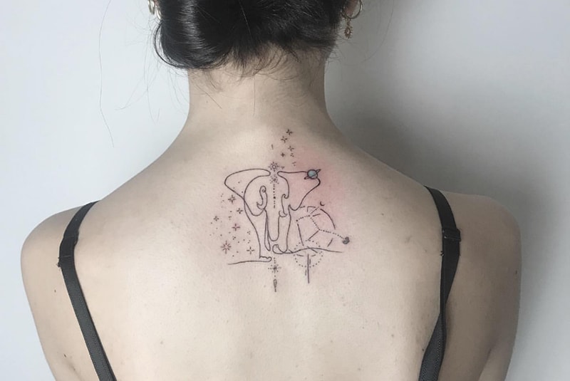 Elephant Virgo tattoo with a constellation