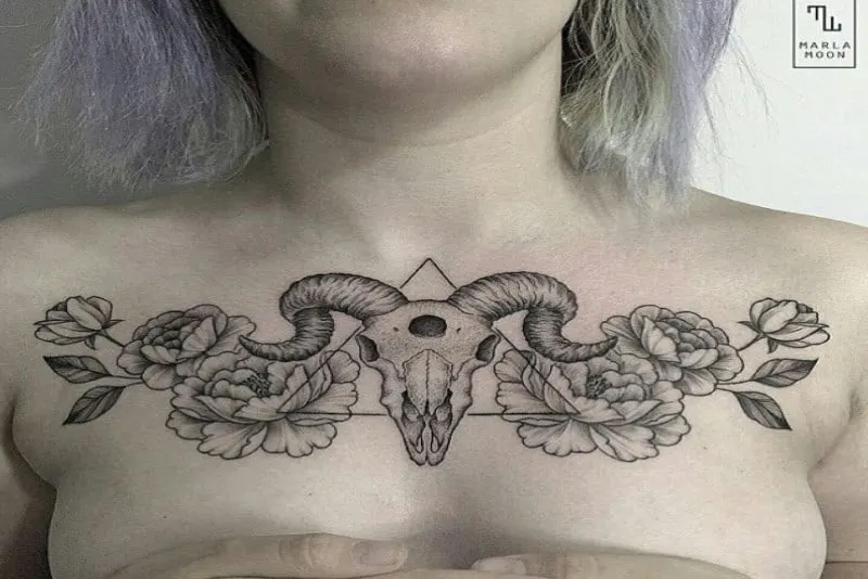 Flower ram skull tattoo on chest