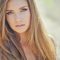 a beautiful woman with long brown hair