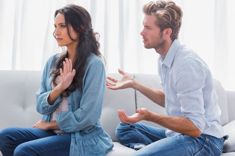woman ignoring man