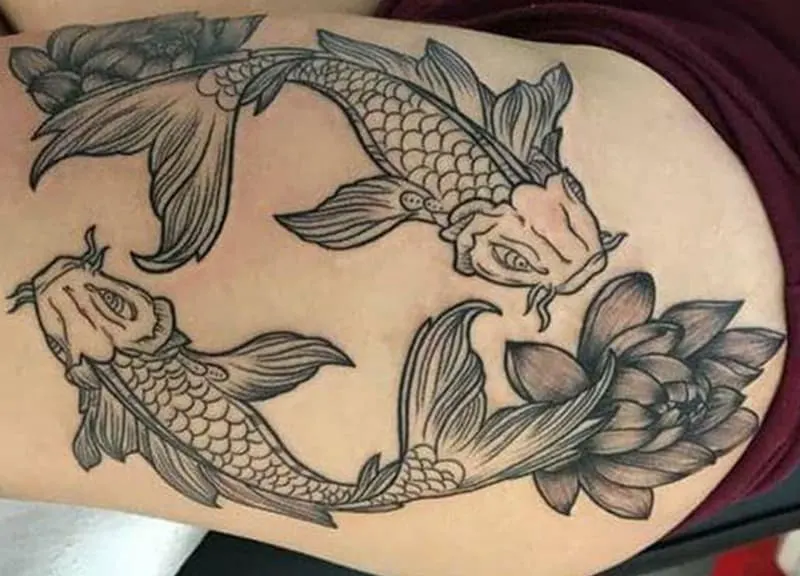 koi fish tattoo with flowers