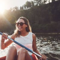woman having fun in the boat