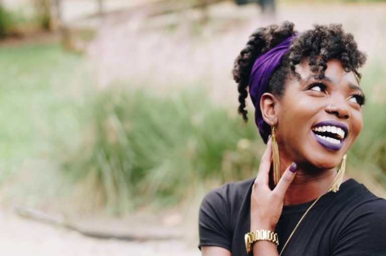 portrait of smiling girl outside