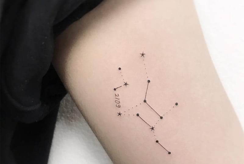 Virgo constellation design with a date tattoo for inside of the arm