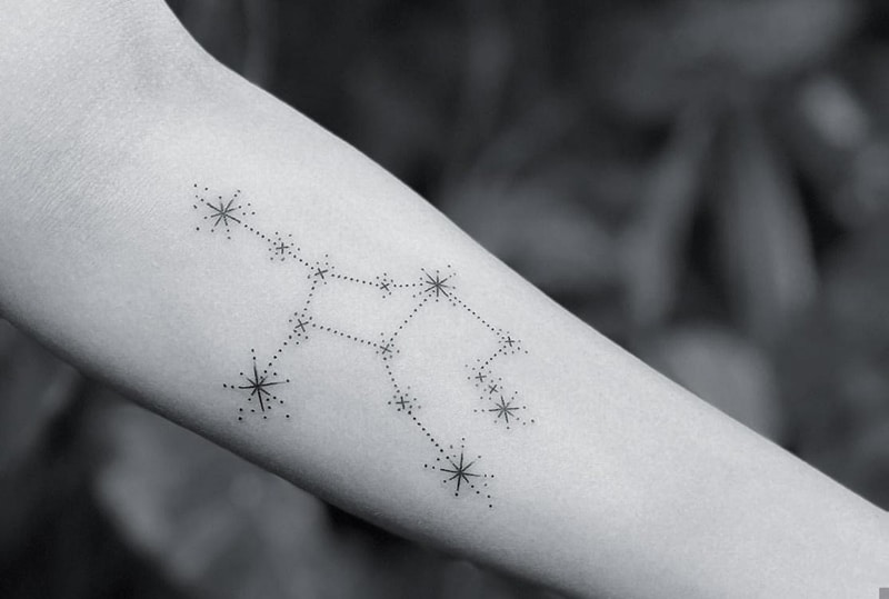 Virgo constellation tattoo on the forearm