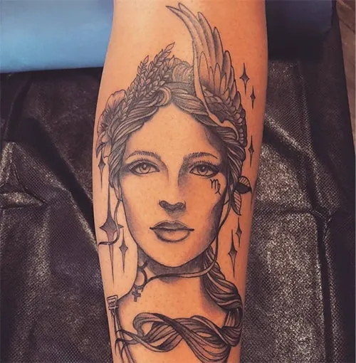 Virgo portrait tattoo with stars and wheat motifs