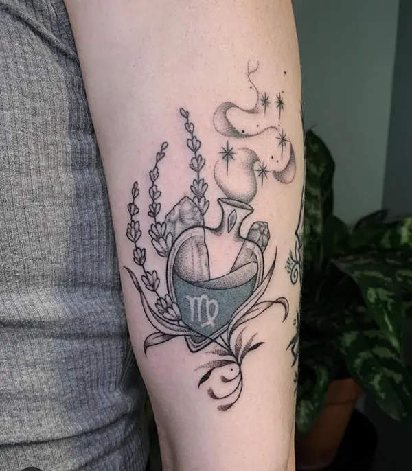 Virgo zodiac symbol in potion bottle tattoo on the arm