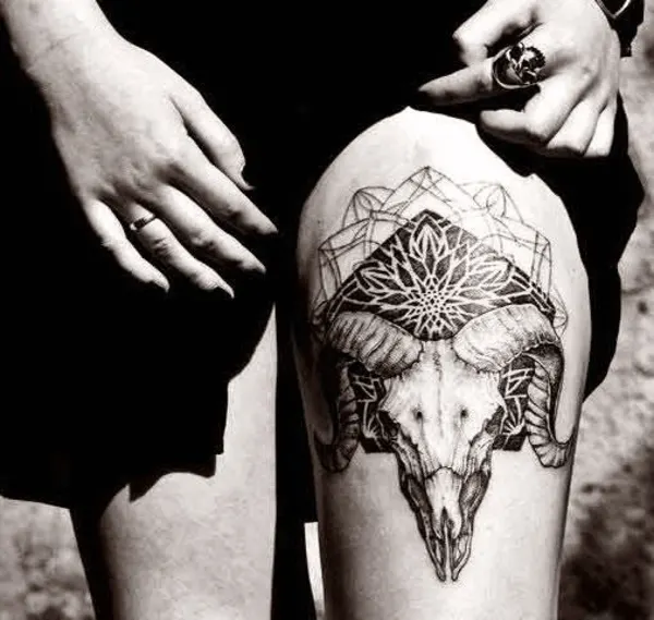 aries animal skull tattoo on leg