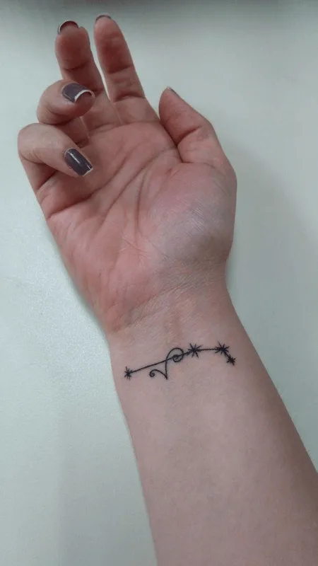 Aries constellation tattoo on wrist