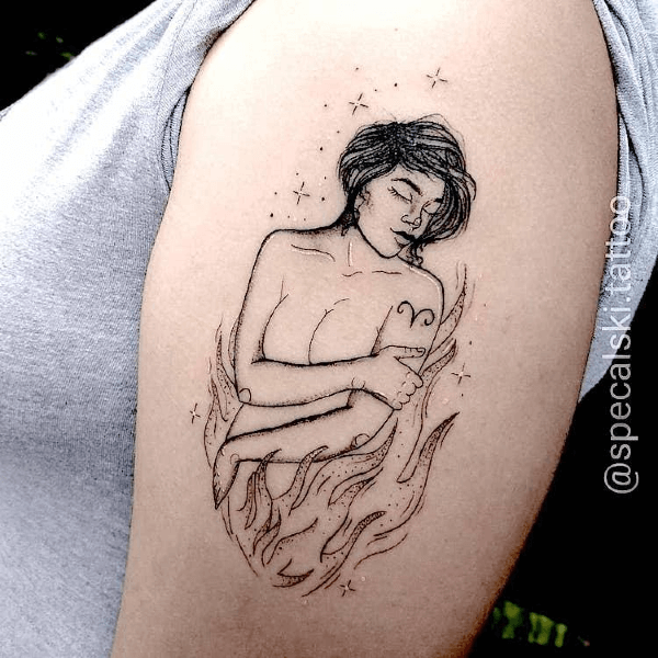 aries girl tattoo on an arm