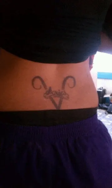 lower back aries sign tattoo