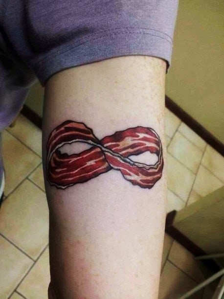 bacon infinity tattoo on arm
