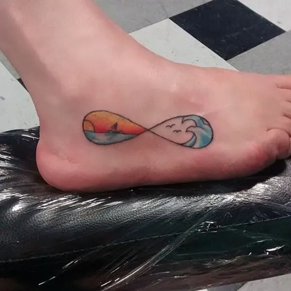 colorful beachy theme design tattoo on foot