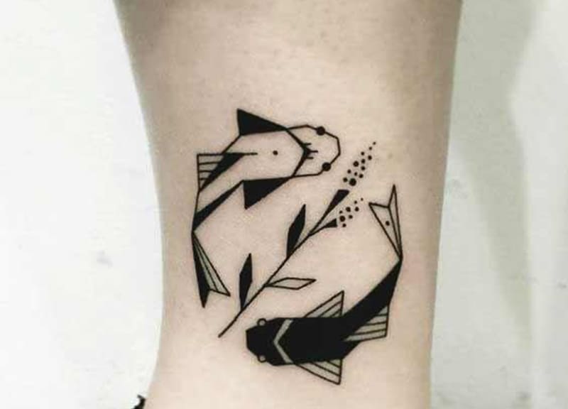 black and transparent geomeric tattoo of pisces