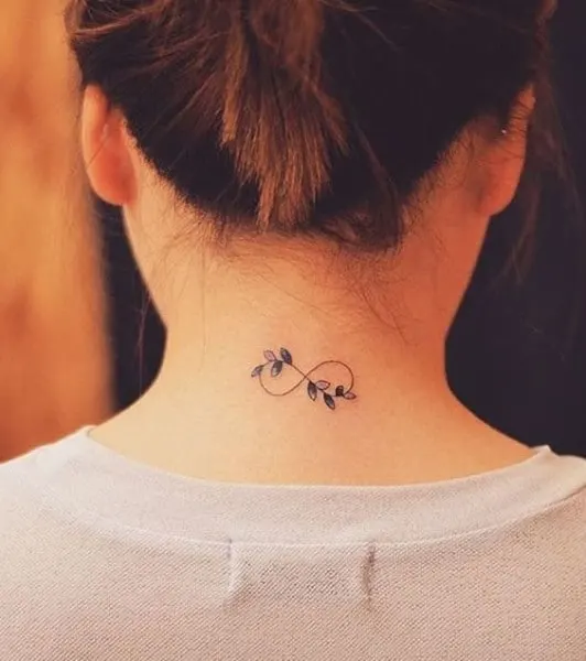 small botanical design tattoo on neck