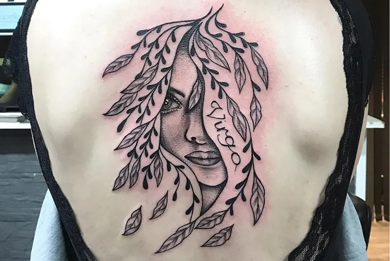 botanical portrait tattoo with word Virgo on the back