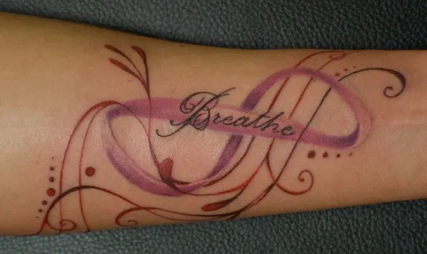 breathe design with purple ribbon sign