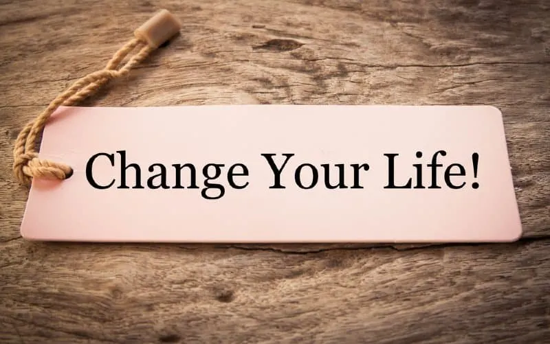 Change your life tag on wooden background