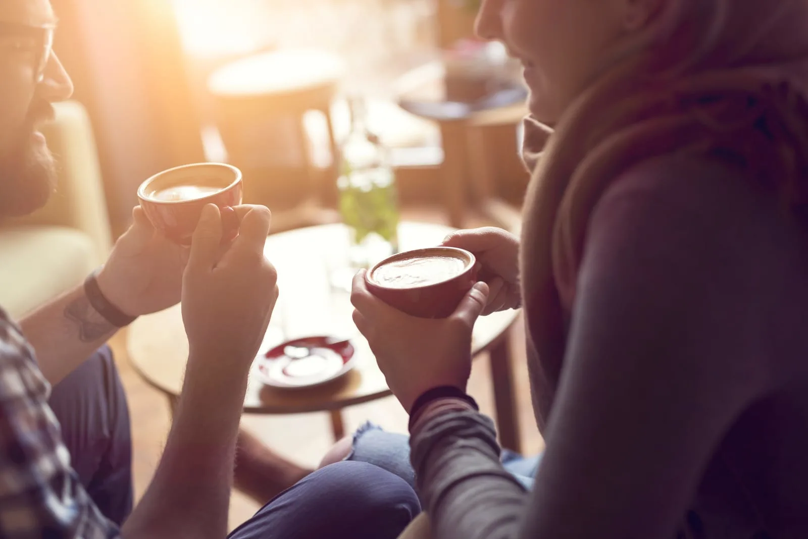  couple in love sitting in a cafe