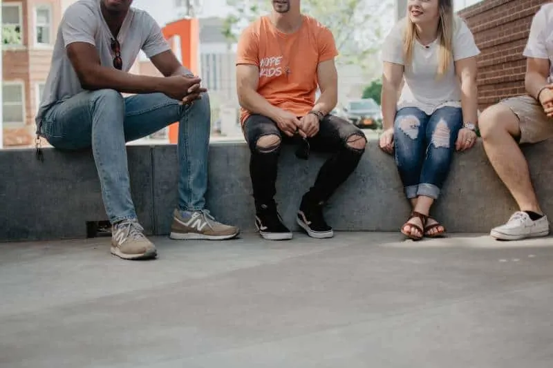 couple of friends sitting outside