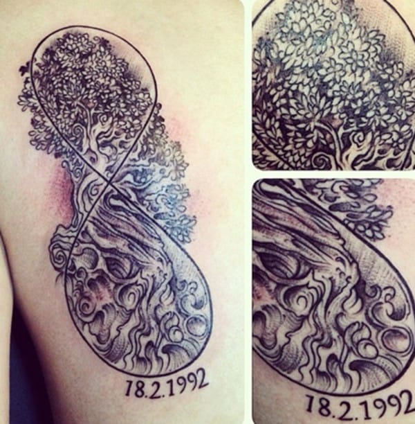 tatuaggio albero avvolto nel simbolo dell'infinito