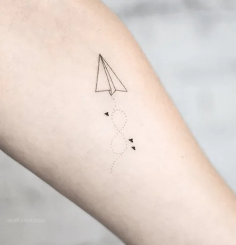 dotted infinity tattoo with DIY-looking paper plane and tiny hearts
