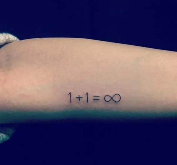 endless love tattoo on arm