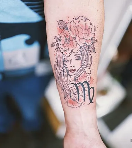 feminine portrait tattoo with Virgo sign on the arm