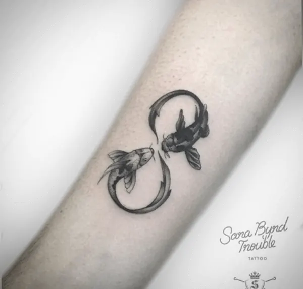 koi fish infinity tattoo on arm