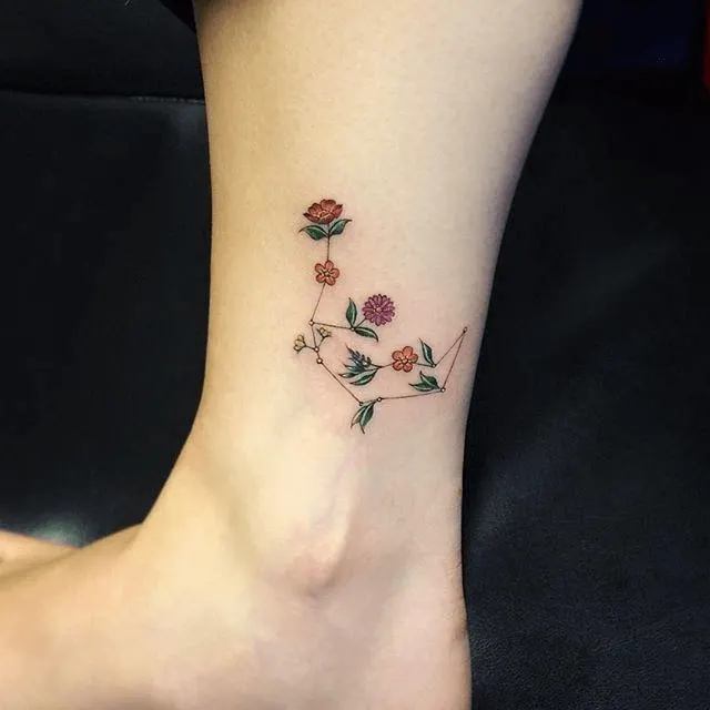 floral aries constellation tattoo on ankle