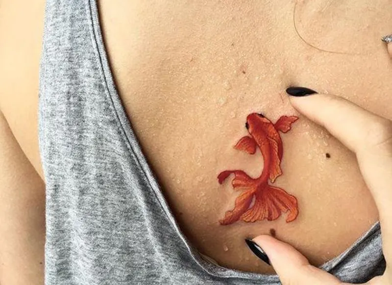 pisces tattoos on chest