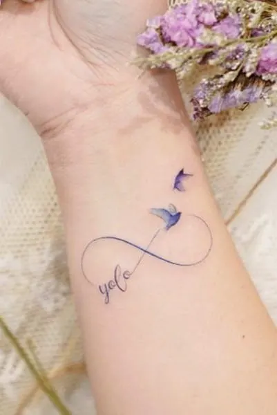 you only live once infinity tattoo with flying birds