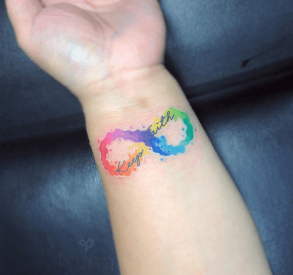 bold and colorful keep faith watercolor tattoo