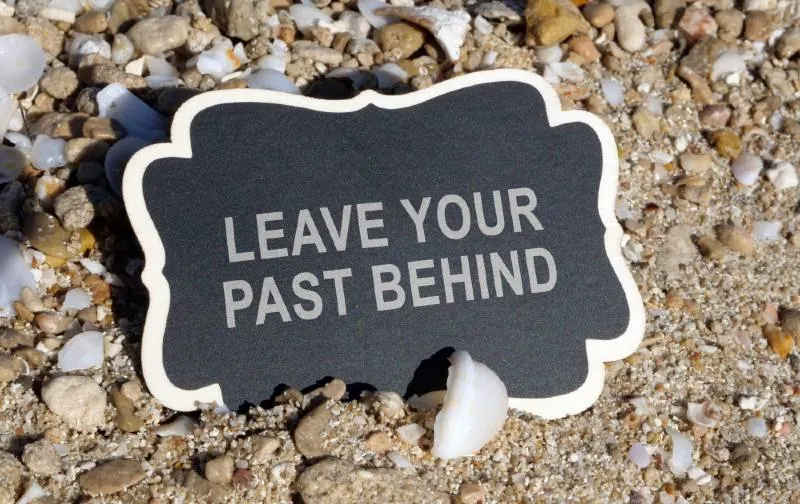 Tag with the words leave your past behind on it