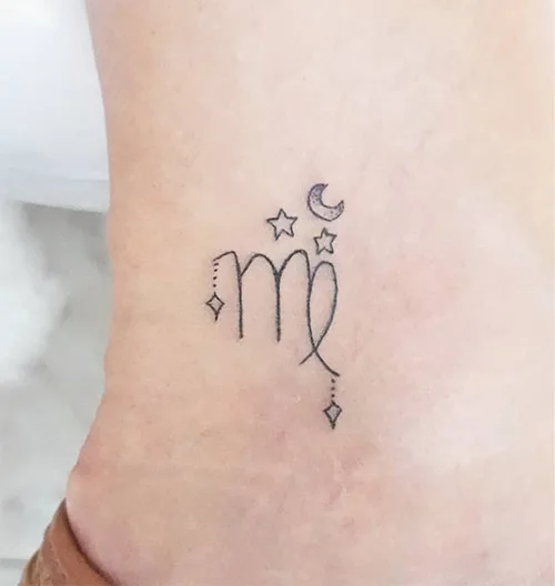 little Virgo sign tattoo on the lower back