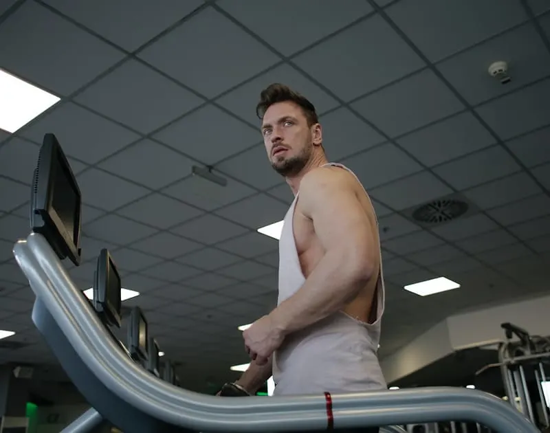 man using treadmill in the gym