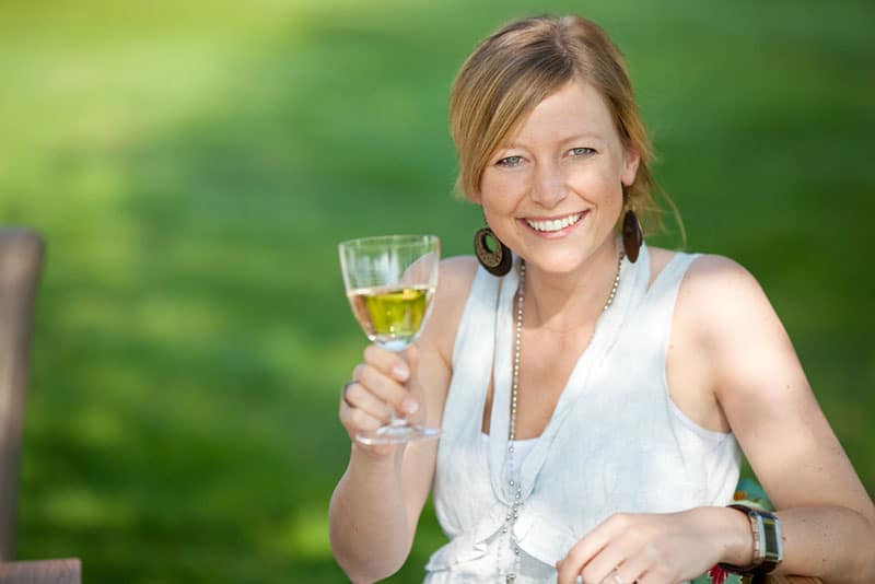 mature woman posing with glass