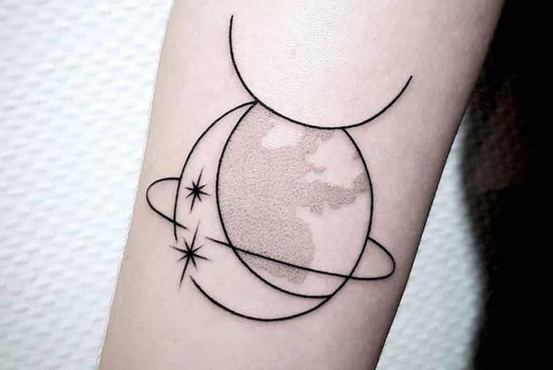 minimal taurus tattoo with a half moon, stars and the zodiac symbol