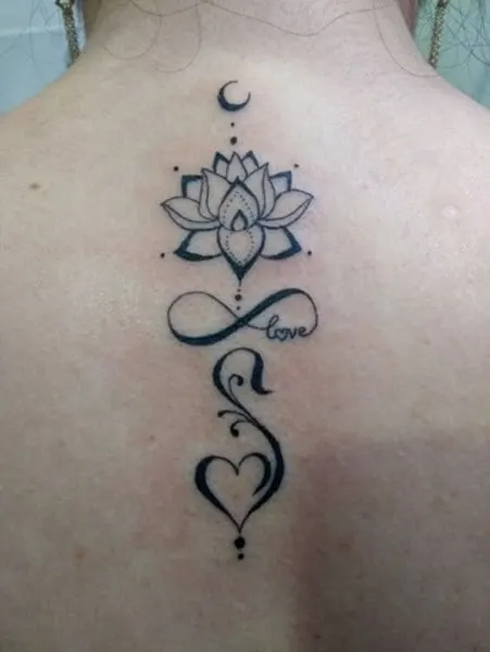 moon and lotus design with infinity symbol tattoo
